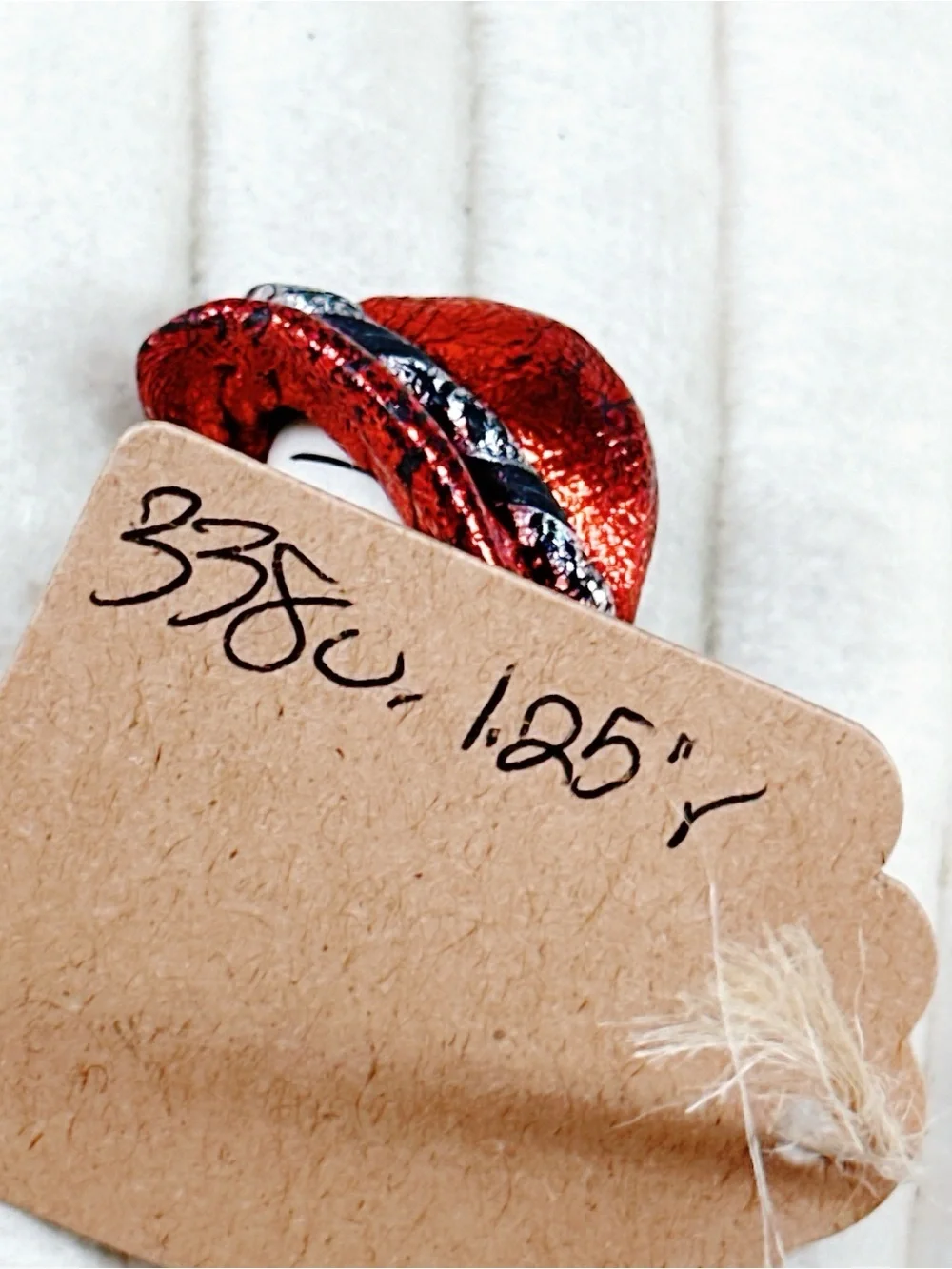 338u. Red Hat Clay Ladyface Brooch